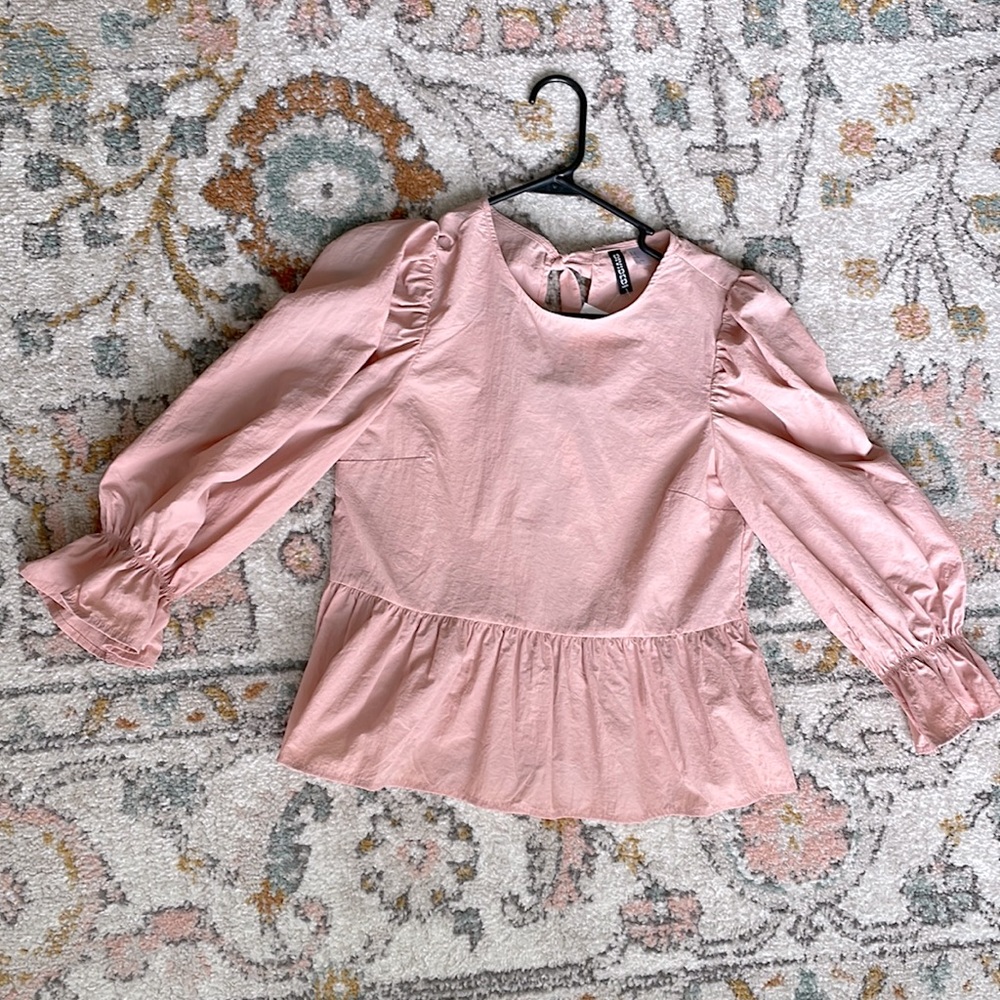 Ballon-sleeve peplum, tie back top